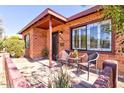 Brick home with inviting front porch and comfortable seating area at 2931 N 8Th Ave, Phoenix, AZ 85013