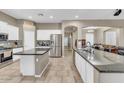 Modern kitchen with granite countertops and stainless steel appliances at 3514 E Parkview Dr, Gilbert, AZ 85295