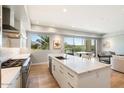Modern kitchen with island, stainless steel appliances, and views at 16580 N 92Nd St # 2001, Scottsdale, AZ 85260