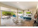 Relaxing outdoor patio with seating area and fireplace at 16944 W Coronado Rd, Goodyear, AZ 85395