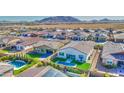 Aerial view of house with pool and neighborhood at 2228 E Isaiah Ave, Gilbert, AZ 85298