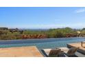 Relaxing pool area with mountain views at 42383 N 111Th Pl, Scottsdale, AZ 85262