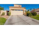 Two-story house with attached garage at 242 E Stonebridge Dr, Gilbert, AZ 85234