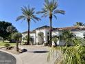 Stunning Spanish-style home with a large driveway and mature landscaping at 2222 N Val Vista Dr # 3, Mesa, AZ 85213