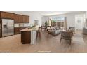 Virtually staged living room and kitchen at 24741 N 175Th Dr, Surprise, AZ 85387