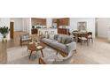 Open living room featuring hardwood floors and modern furniture at 24741 N 175Th Dr, Surprise, AZ 85387