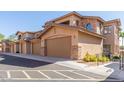 Two-story stucco building with three-car garage at 15550 S 5Th Ave # 108, Phoenix, AZ 85045