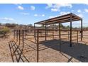 Metal framed corral with shade structure for horses at 685 N Horseshoe Trl, Wickenburg, AZ 85390