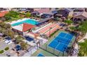 Aerial view of community pool, bocce ball, and pickleball courts at 18208 W Daley Ln, Surprise, AZ 85387