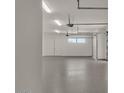 Spacious and bright garage with epoxy flooring at 37200 N Cave Creek Rd # 1002, Scottsdale, AZ 85262