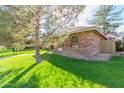 Brick home with side yard and walkway at 234 N Heritage Dr, Gilbert, AZ 85234