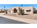 Single story home with a two-car garage and front yard at 14610 N Bolivar Dr, Sun City, AZ 85351