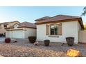 House exterior with two-car garage at 15228 W Elm St, Goodyear, AZ 85395