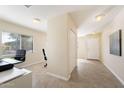 Entryway with tile floors, office space, and interior door at 28629 N Zircon Ct, San Tan Valley, AZ 85143