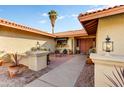 Front entry with courtyard and inviting walkway at 15863 N 46Th Pl, Phoenix, AZ 85032