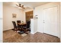 Cozy dining area with a round table and four chairs at 14950 W Mountain View Blvd # 1305, Surprise, AZ 85374