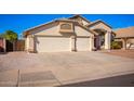 Single story home with a two car garage at 3256 S Emery Cir, Mesa, AZ 85212