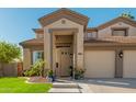 Two-story house with a three-car garage and entryway at 959 W Myrtle Dr, Chandler, AZ 85248