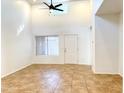 Bright living room with tile floors and high ceilings at 8940 W Olive Ave # 134, Peoria, AZ 85345