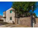 Exterior view of two-story building with gated entrance at 600 S Dobson Rd # 18, Mesa, AZ 85202