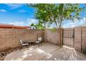 Private patio with seating area and gate access at 600 S Dobson Rd # 18, Mesa, AZ 85202