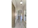 Bright and airy entryway with wood-look floors and neutral color scheme at 3114 E Winged Foot Dr, Chandler, AZ 85249