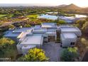 Luxury home with expansive roofline and courtyard at 10755 E Stoney Ln, Scottsdale, AZ 85262