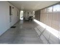 Long covered carport provides ample parking and protection from the elements at 9302 E Broadway Rd # 51, Mesa, AZ 85208