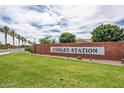 Entrance to Cooley Station community, with a brick wall and landscaping at 4307 E Jesse St, Gilbert, AZ 85295