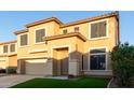 Two-story house with a two-car garage and artificial turf at 6321 S Teresa Dr, Chandler, AZ 85249