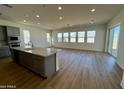 Spacious kitchen with island, modern appliances, and ample natural light at 3812 W Antelope Way, San Tan Valley, AZ 85144