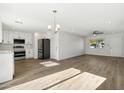 Modern kitchen featuring stainless steel appliances and white cabinets at 3121 W Libby St, Phoenix, AZ 85053