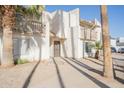 Condo building exterior showcasing entrance and landscaping at 3840 N 43Rd Ave # 58, Phoenix, AZ 85031