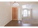 Bright entryway with tile flooring and views to the living room at 16847 S 13Th Way, Phoenix, AZ 85048