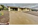Long driveway leading to a single-story home's garage at 5522 E Colby St, Mesa, AZ 85205