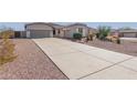 Long driveway leading to a two-car garage at 2237 N Calle Largo --, Mesa, AZ 85207