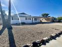 Single story home with gravel landscaping at 2213 E Janice Way, Phoenix, AZ 85022