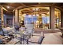 Glass-walled patio with a view of the living room at 5802 E Cholla Ln, Paradise Valley, AZ 85253