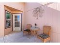 Small patio area with a table and chairs, ideal for outdoor relaxation at 8500 E Southern Ave # 575, Mesa, AZ 85209