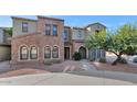 Two-story home with stone exterior and landscaped walkway at 20750 N 87Th St # 2142, Scottsdale, AZ 85255