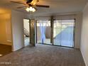 Living room with sliding door to patio at 3500 N Hayden Rd # 1903, Scottsdale, AZ 85251