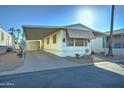 Attractive single-wide home with carport and landscaping at 9333 E University Dr # 177, Mesa, AZ 85207