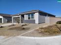One story home with gray exterior and two car garage at 24078 W Pecan Rd, Buckeye, AZ 85326