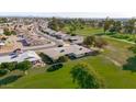 Community overview showcasing homes near a golf course at 10861 W Venturi Dr, Sun City, AZ 85351