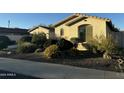 Single-story house with desert landscaping and two-car garage at 6216 W Hedgehog Pl, Phoenix, AZ 85083