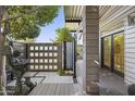 Private backyard patio with a modern water feature and comfortable seating at 8614 E Berridge Ln, Scottsdale, AZ 85250