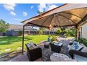Relaxing backyard patio with covered seating area at 15912 W Central St, Surprise, AZ 85374