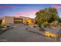 Attractive desert landscape and walkway to home entrance at 15406 E Cavedale Dr, Scottsdale, AZ 85262