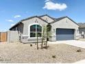 One-story home with gray exterior and blue garage door at 1988 W Cameron Blvd, Coolidge, AZ 85128