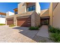 Contemporary home exterior with double garage and walkway at 6311 E Phoenician Blvd # 18, Scottsdale, AZ 85251